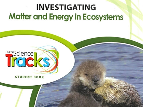 Front cover of the textbook "BSCS Science Tracks: Investigating Matter and Energy in Ecosystems, Student Edition", with a picture of a mother sea otter and her pup.